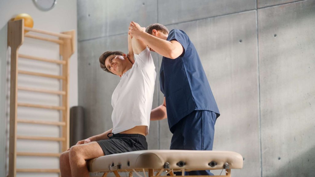 Man getting osteopathic treatment